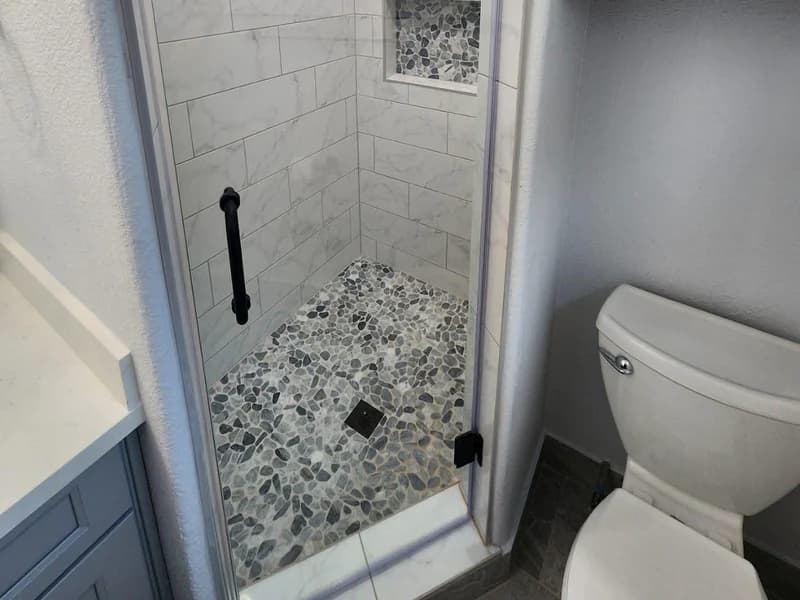 Small bathroom shower remodel with updated tile